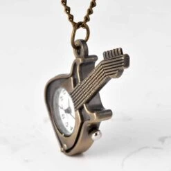 Montre Vintage De Poche En Forme De Guitare 6 Montre Vintage De Poche En Forme De Guitare -Vintage Soldes montre vintage de poche en forme de guitare 3