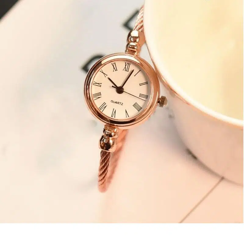 Petite Montre Vintage En Acier Inoxydable à Quartz Pour Femme Cuivré Et Blanc 1 Petite Montre Vintage En Acier Inoxydable à Quartz Pour Femme Cuivré Et Blanc